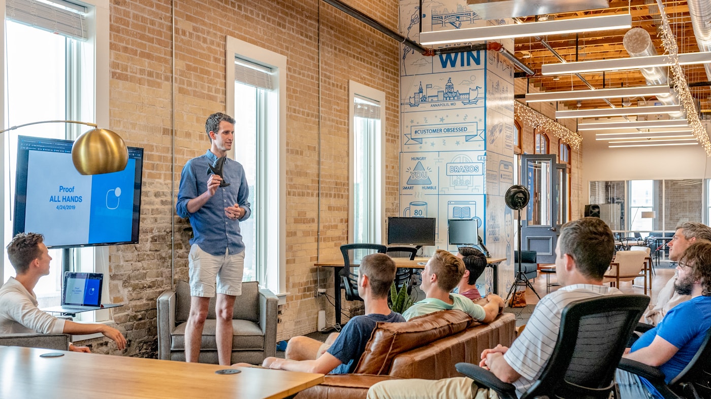 A bright, modern advisory office with the team at work